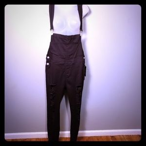 Black stretch ripped overalls